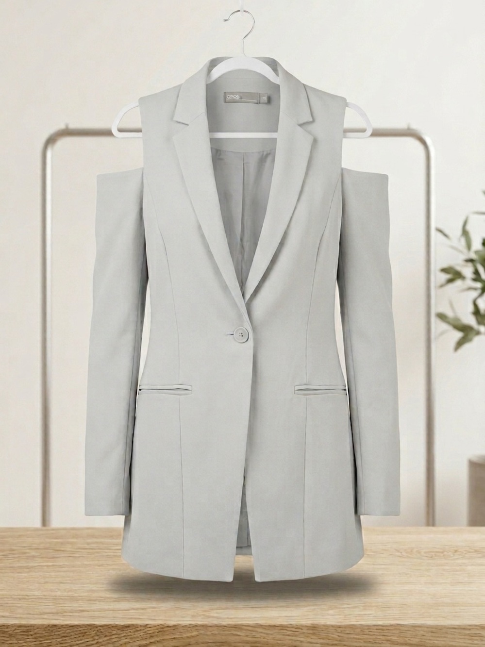 Pale blue cold shoulder suit with matching tapered pants in size 4